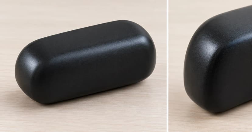 Photo-based edited views of a detached rounded black tracker case exterior and a separate partial side-profile detail