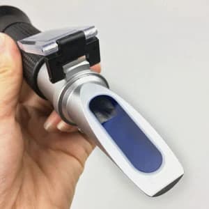 Salinity Refractometer for Seawater and Marine Fishkeeping Aquarium 0-100 PPT with Automatic Temperature — collection imagery